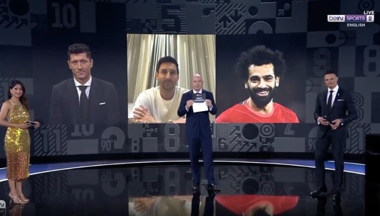 Messi y Lewandowski en el momento de conocer al ganador. /Captura de pantalla