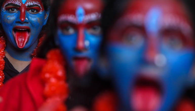 Mumbai (India), 03/09/2023.- Indian college girls with their faces painted in blue and red and dressed as the Hindu goddess Kali pose for photographs during the Janamashtami festival celebrations at Shreemati Nathibai Damodar Thackersey (SNDT) college in Mumbai, India, 04 September 2023. Every year the college students celebrate the festival by dressing up as one of the many Hindu goddesses. 'Janamashtmi' is celebrated as the birth anniversary of Lord Krishna. EFE/EPA/DIVYAKANT SOLANKI